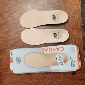 Lightly used and slightly trimmed New Balance Insoles